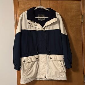 Ladies pacific trail two toned nylon & polyester jacket with hood.